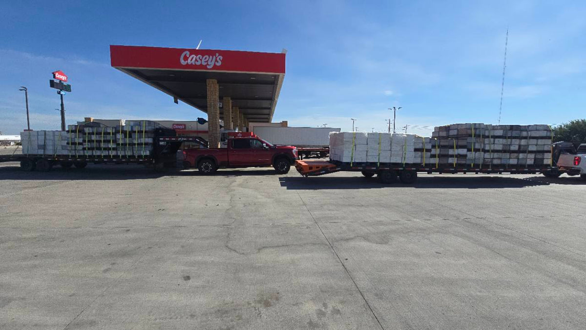 Loaded hive trailers and trucks during bee transport